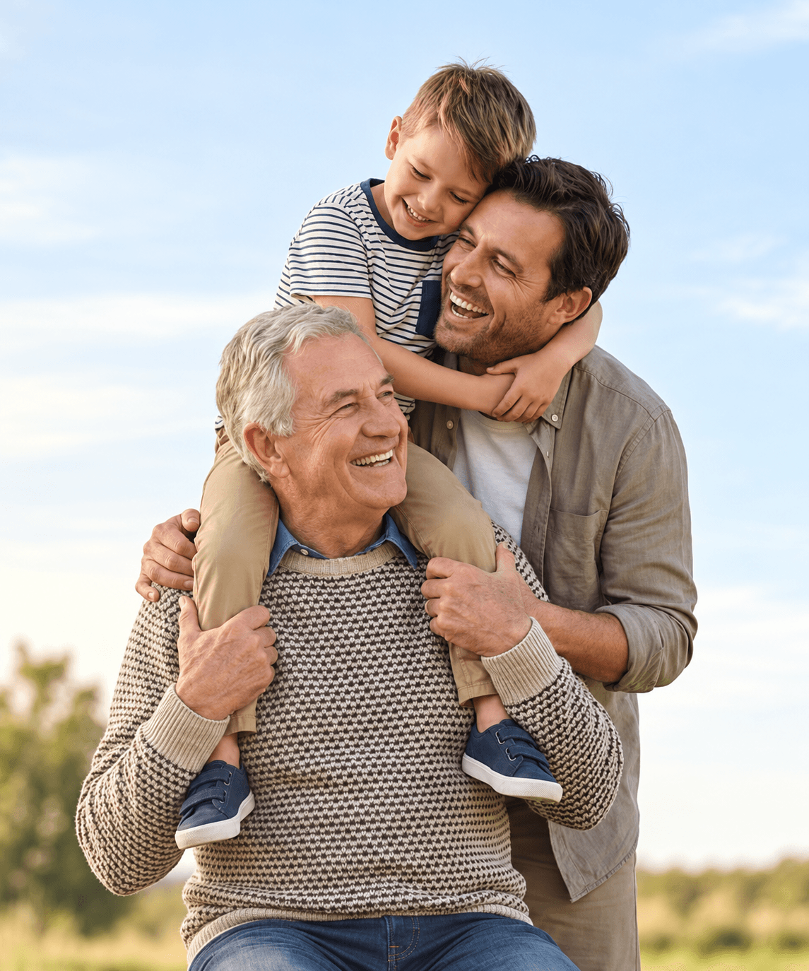 Three generations of a family laughing together