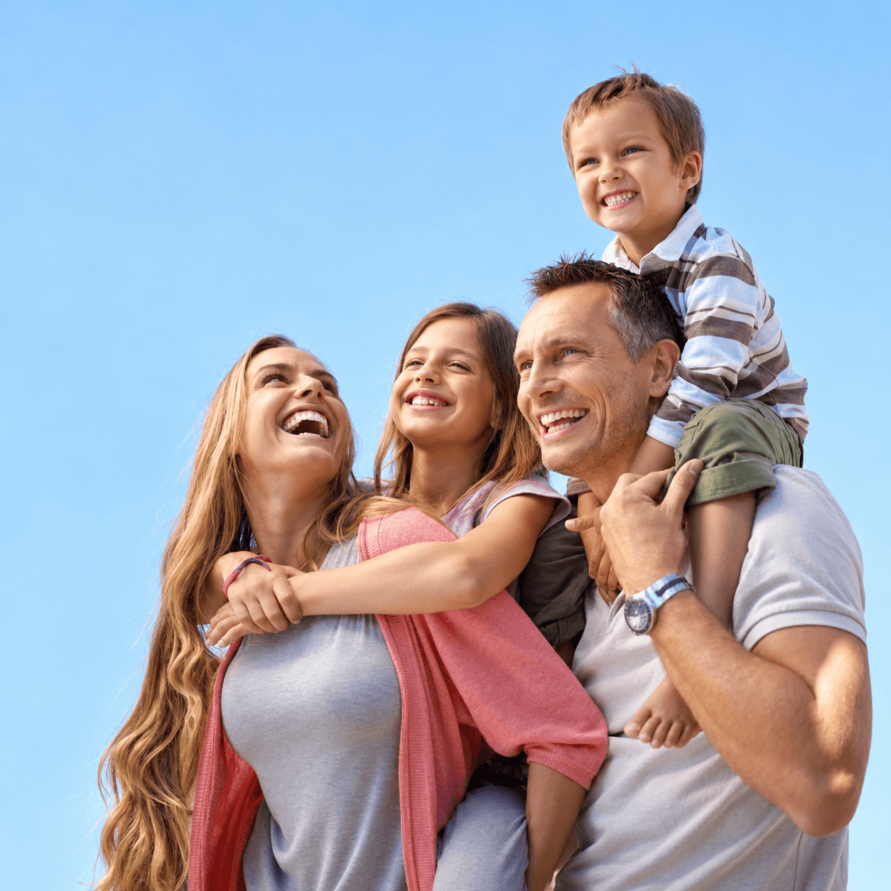 Parents and their children enjoying a sunny day