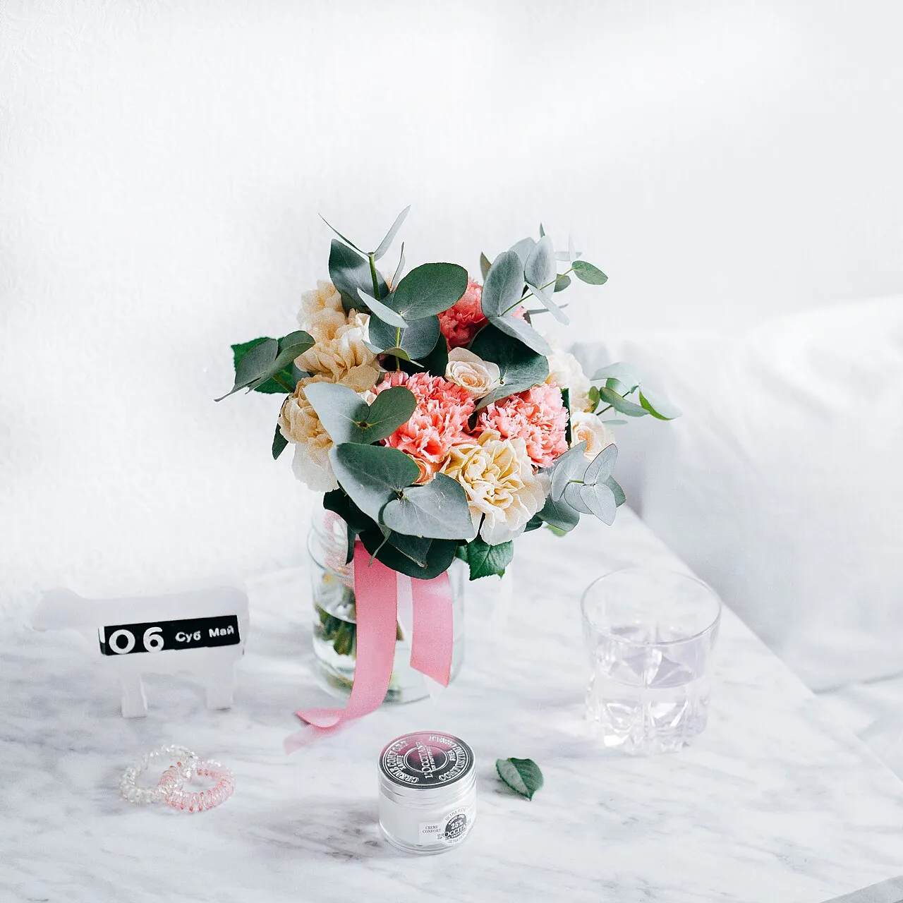 A softly lit arrangement of flowers